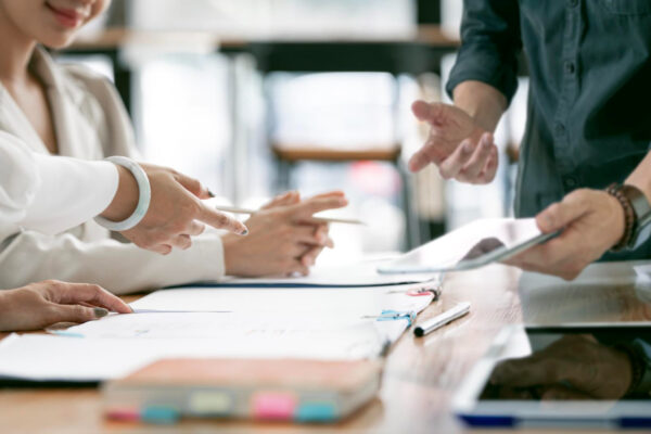 business-people-advisor-two-business-people-talking-planning-analyze-investment-and-marketing-on-tablet-in-office